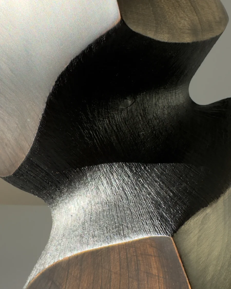 Close-up of hand textured charred interior on hand carved apple wood vase
