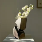 Abstract apple wood vase with organic curved form and yakisugi textured interior