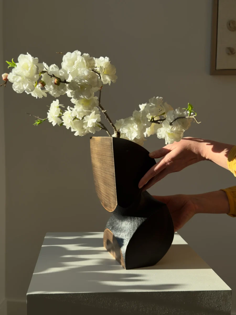 Modern organic wood art object with asymmetrical hand carved form