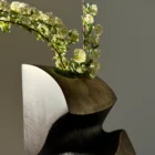 Handmade apple wood vase designed for fresh flowers with removable glass tube