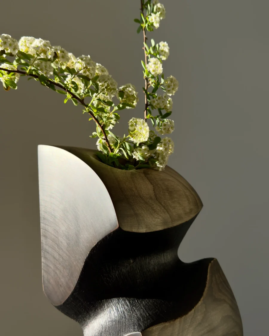 Handmade apple wood vase designed for fresh flowers with removable glass tube