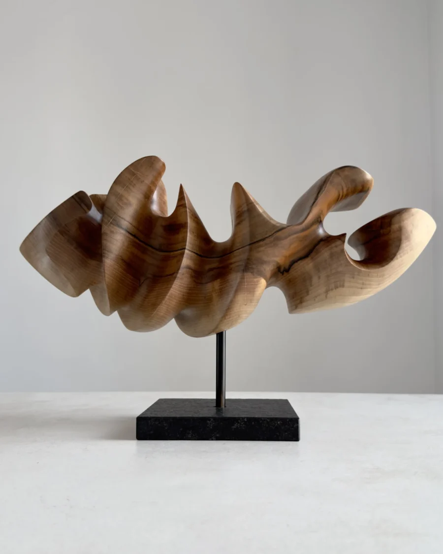 abstract wood sculpture walnut point of hold