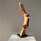 Hand carved apple wood sculpture “Soul of the Tree” on black granite base