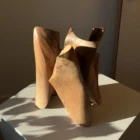 threefold-balance-japandi-wood-sculpture Sculptural walnut wood object with interconnected flowing forms and open negative spaces