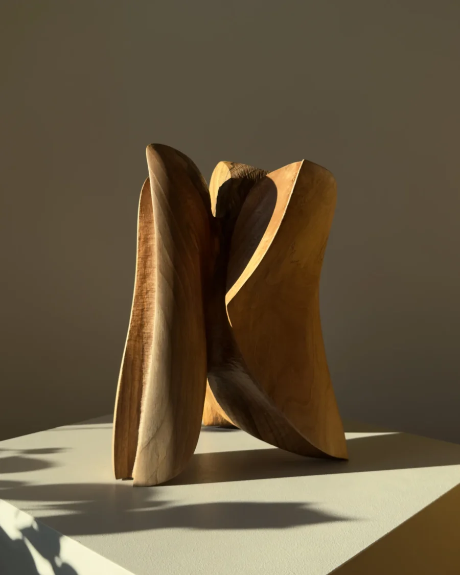 threefold-balance-organic-wood-sculpture-back-view Modern hand carved wood sculpture with flowing organic curves made from solid walnut wood