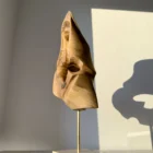 through-the-light-abstract-sculpture-profile Profile view of Through the Light abstract walnut sculpture showing carved opening and flowing form