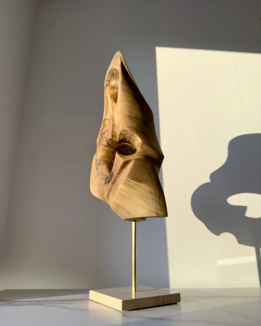 through-the-light-abstract-sculpture-profile Profile view of Through the Light abstract walnut sculpture showing carved opening and flowing form