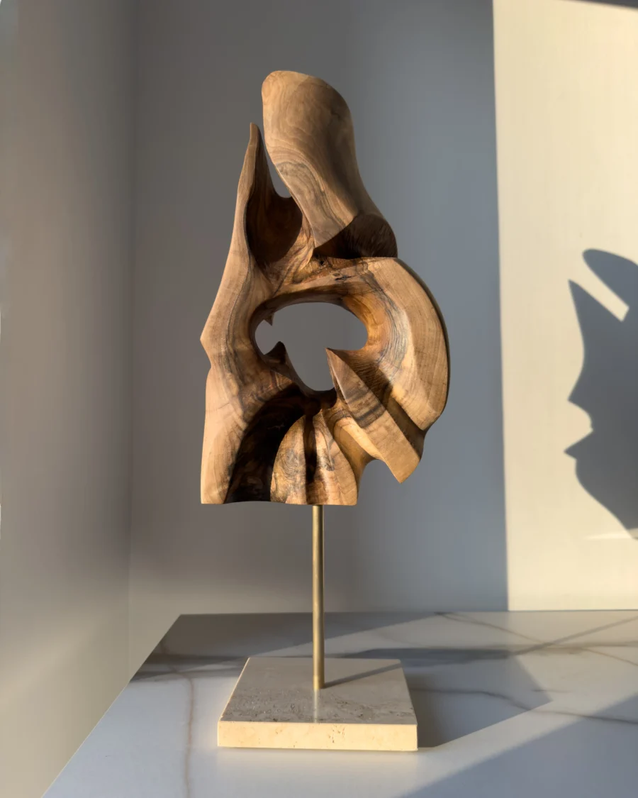 through-the-light-walnut-sculpture-soft-light Hand carved walnut wood sculpture Through the Light in minimalist interior with soft evening light
