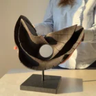 trace-of-fire-front-view-sculpture Front view of “Trace of Fire” abstract walnut wood sculpture on black granite base in natural golden light.