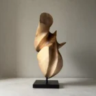 wood-sculpture-light-shadow-virella walnut wood sculpture interplay of light and shadow abstract form