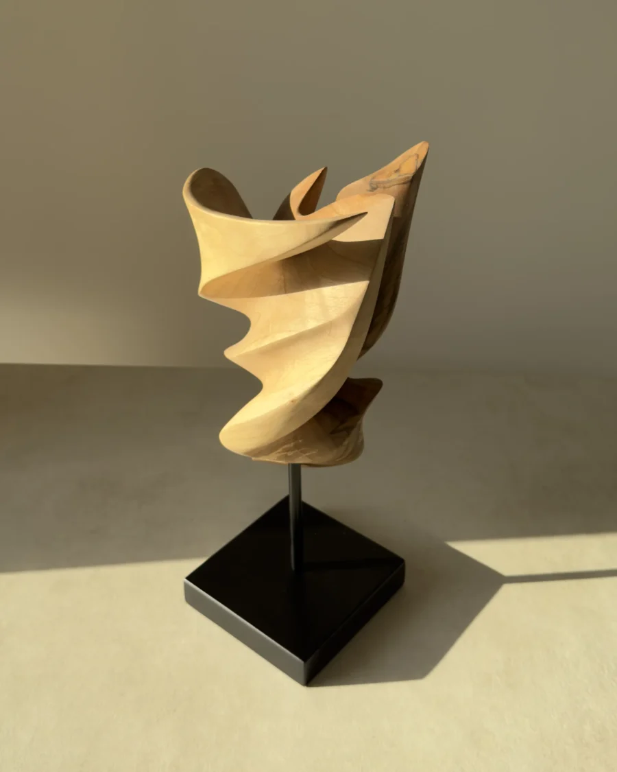 Breath of Fire contemporary walnut sculpture balancing movement and stillness