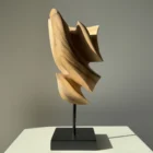 Breath of Fire abstract walnut sculpture showing flowing spiral forms and natural wood grain