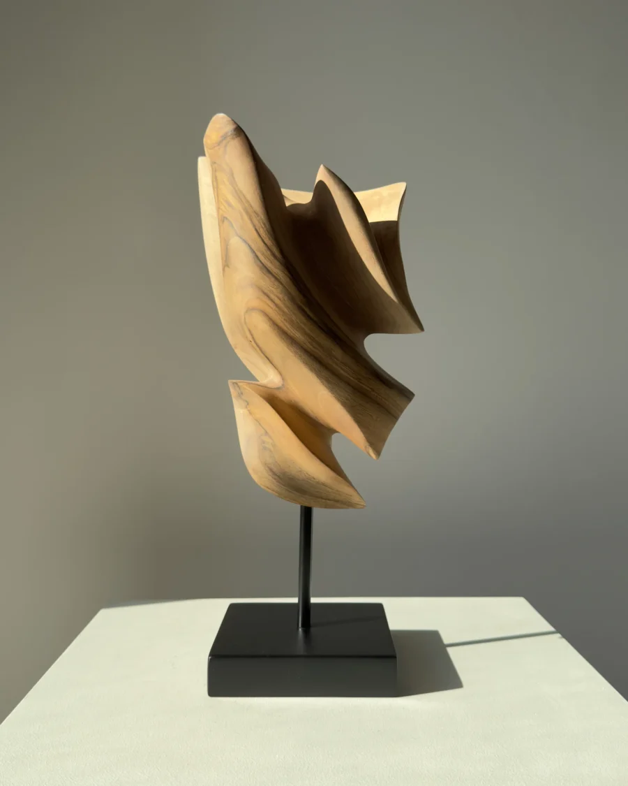 Breath of Fire abstract walnut sculpture showing flowing spiral forms and natural wood grain