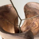 dualis-walnut-vase-interior-detail Close-up of the sculpted interior of the walnut vase showing natural grain, knots and hand-carved texture.