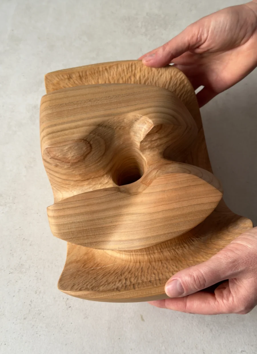 Top view of Memory Lines cherry wood ikebana vessel showing carved opening and sculptural interior