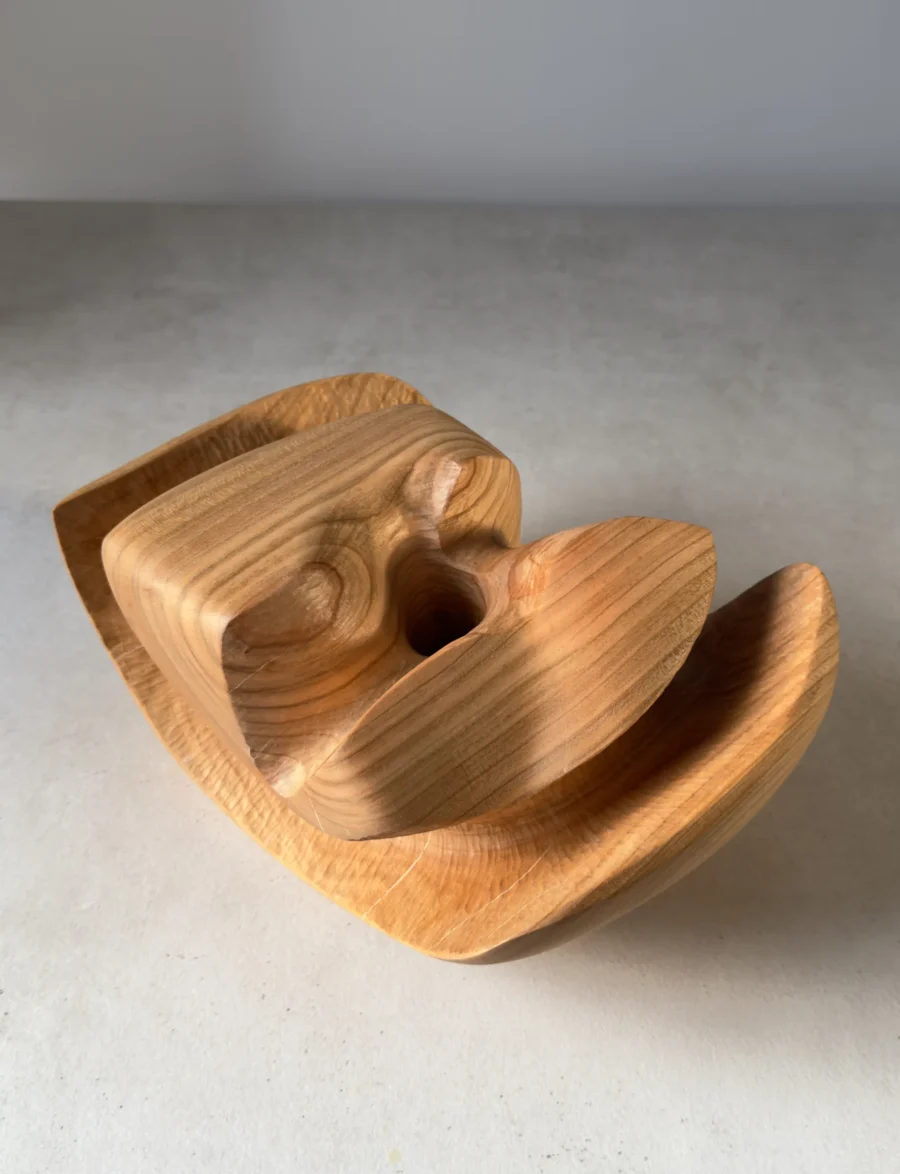 Close-up top view of Memory Lines wooden ikebana vase highlighting grain direction and carved contours