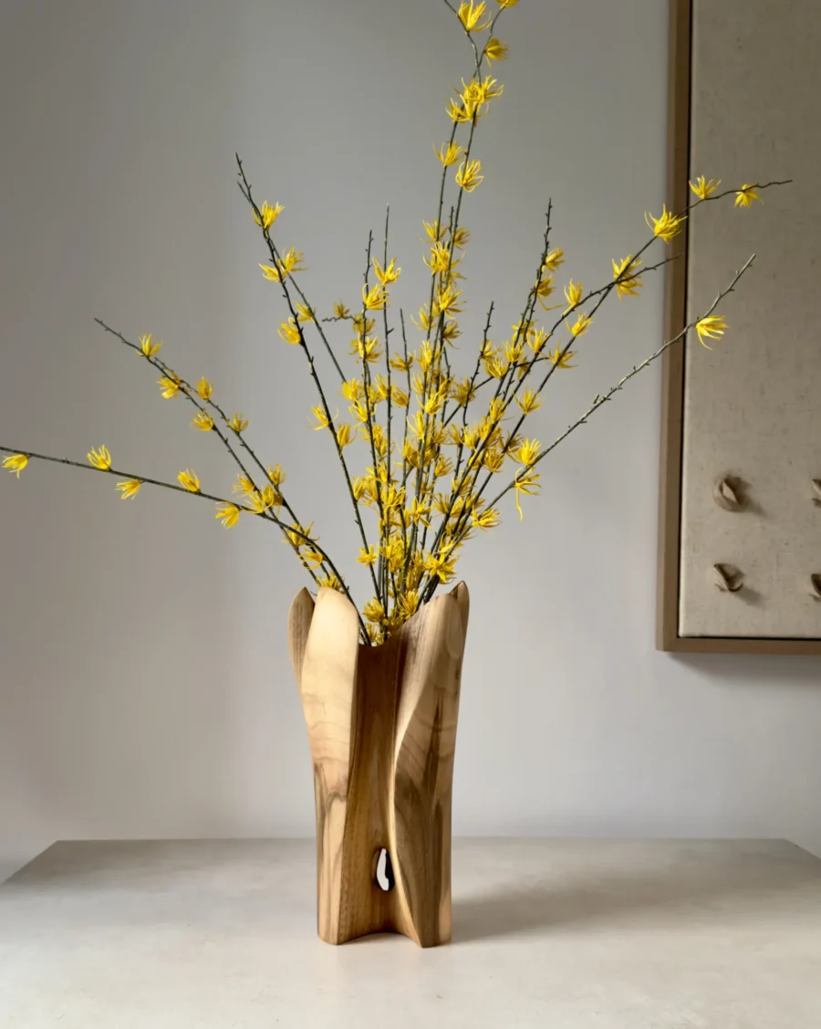quiet-bloom-organic-walnut-vase-front One of a kind walnut wood vase with white blossoms photographed in natural light