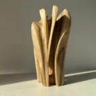 quiet-bloom-walnut-vase-side-view Hand carved walnut wood vase with smooth flowing surfaces and natural matte finish