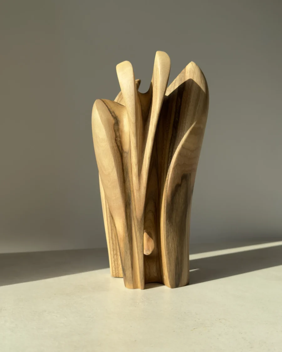 quiet-bloom-walnut-vase-side-view Hand carved walnut wood vase with smooth flowing surfaces and natural matte finish