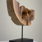 quiet-span-walnut-wood-sculpture-right-side Right side view of Quiet Span walnut wood sculpture emphasizing the flowing transitions of the carved form.