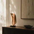 Veil of Air apple wood sculpture displayed in a Japandi inspired interior with natural light