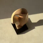 Top view of abstract wood sculpture showing sculptural opening