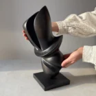 Abstract apple wood sculpture "Poise" emphasizing its balanced organic form and elegant proportions.
