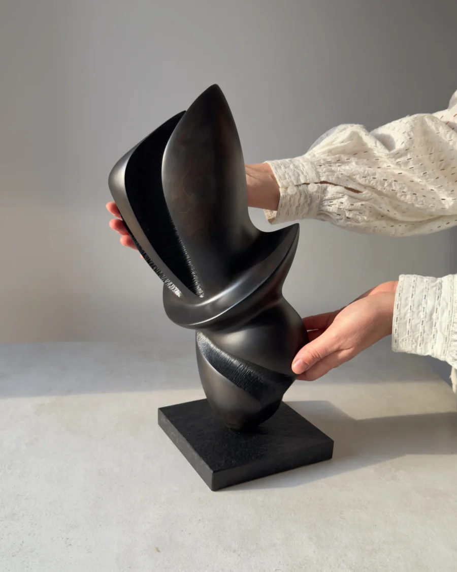 Abstract apple wood sculpture "Poise" emphasizing its balanced organic form and elegant proportions.