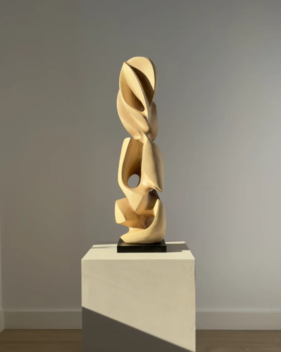 Front view highlighting the balanced relationship between the sculpture's organic forms.
