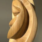 Detail of the smooth hand-finished surface reflecting natural light.