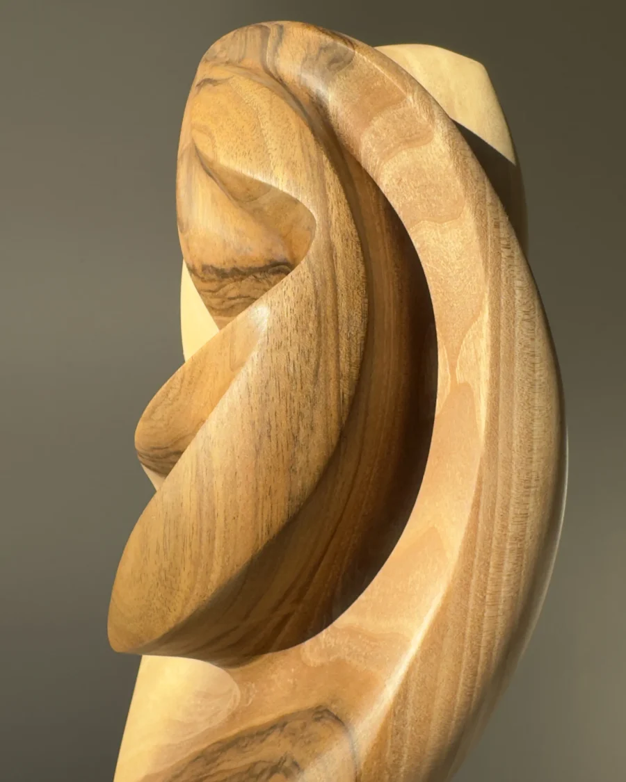 Detail of the smooth hand-finished surface reflecting natural light.