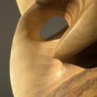 Close-up revealing the natural transition from warm beige to deep brown walnut grain.