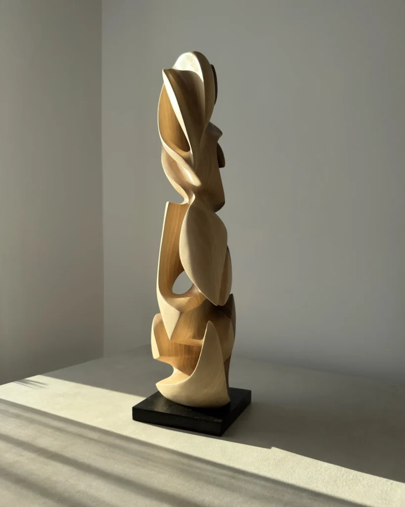 Front View of walnut wood sculpture convergence, made by ewebohome