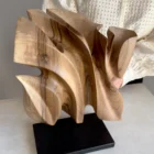 Different view of Folded Presence, a one-of-a-kind hand-carved walnut wood sculpture that changes with every angle.