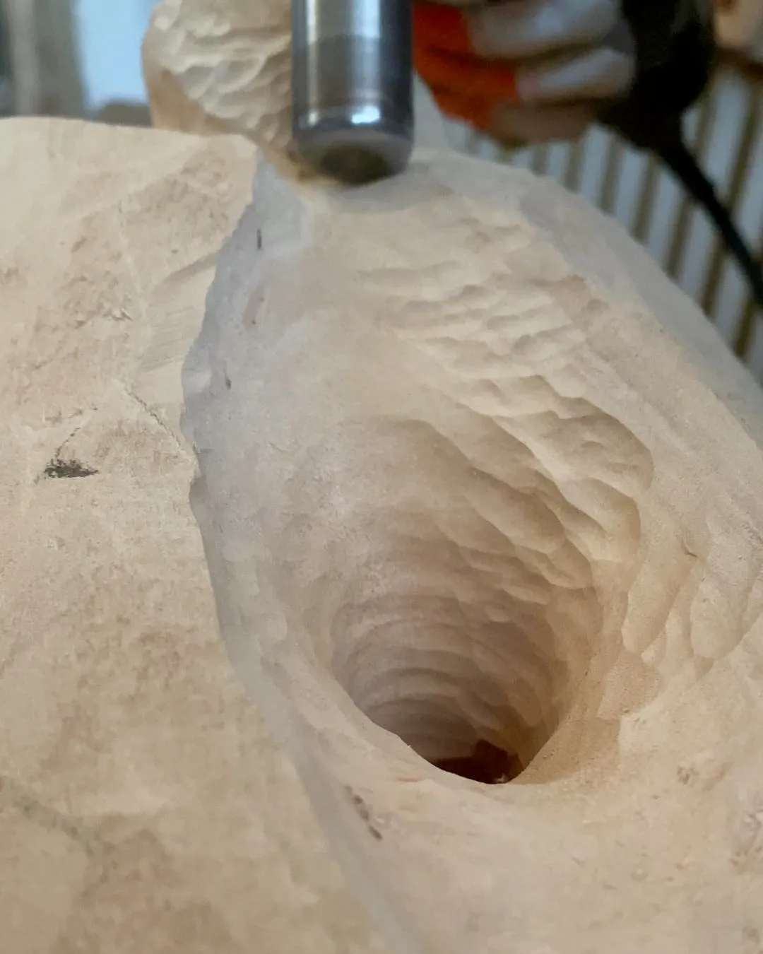 Refining the inner curve of the Sway sculpture while shaping the flowing relationship between solid wood and open space.