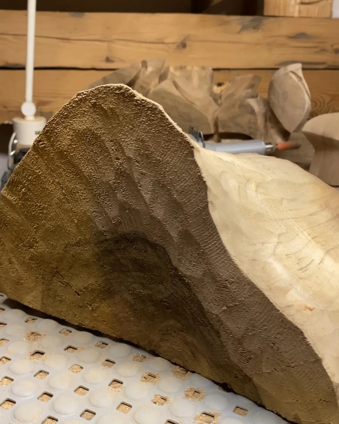 Solid walnut block before carving begins for the abstract wood sculpture Folded Presence.