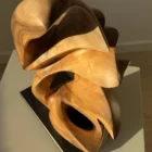 aperture-walnut-sculpture-top-detail Aperture