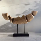 Side perspective of Dynamic Contours showing the flowing carved planes, angular transitions and natural walnut grain.