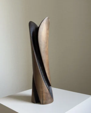 Front view of Emergence with white gypsophila, the flowers emerging between two elongated smooth cherry wood planes.